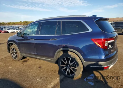 2020 Honda Pilot Touring from USA, damaged, VIN 5FNYF6H9XLB044410